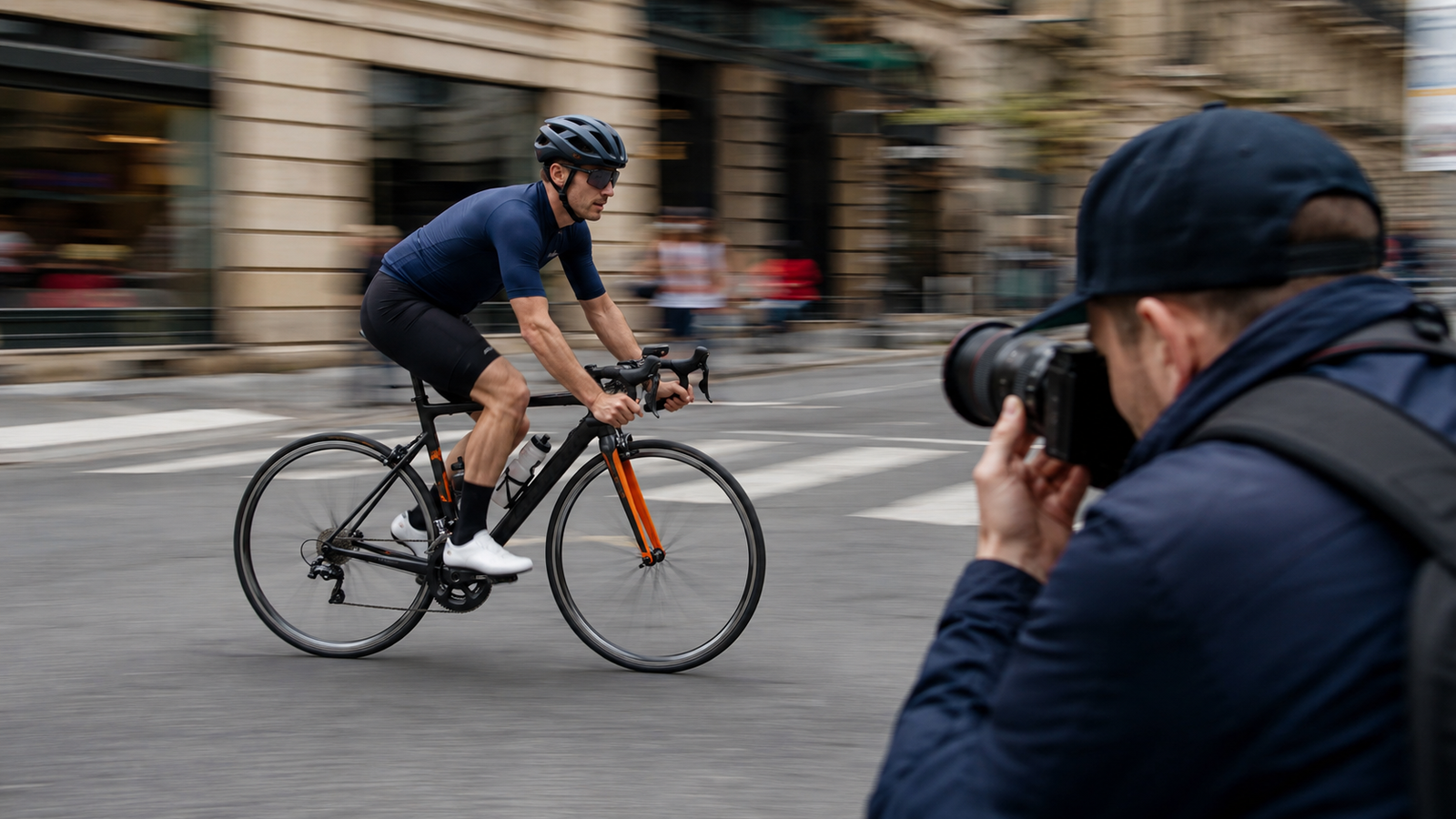 Photographer panning with a cyclist to demonstrate shutter speed